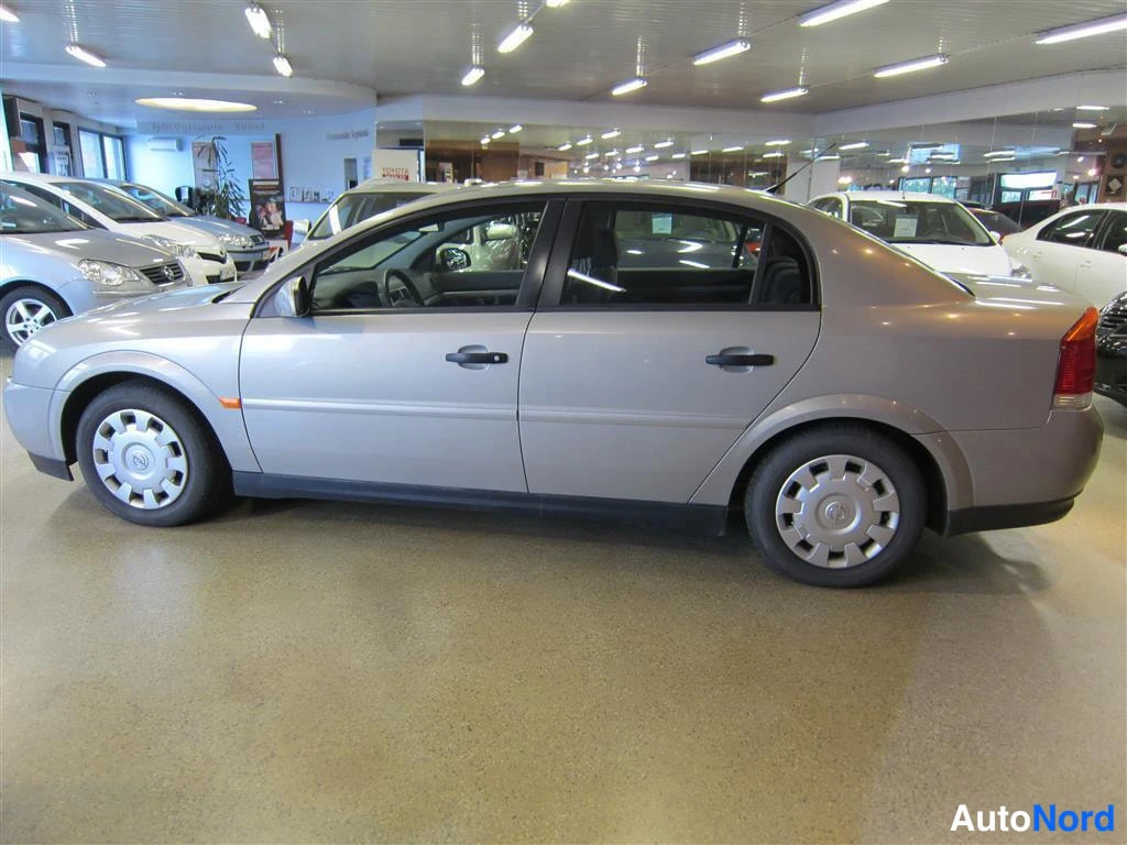 Beige Opel Vectra 2006, etuviisto, keula vasemmalle, kuva 2