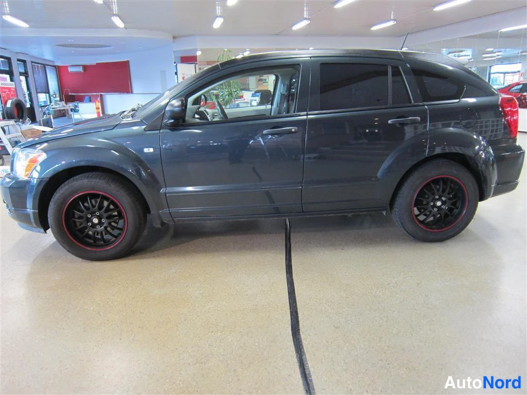 Sininen Dodge Caliber 2008, etuviisto, keula vasemmalle, kuva 2