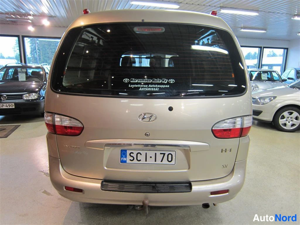 Ruskea Hyundai H1 Van 2005, takaa, kuva 5