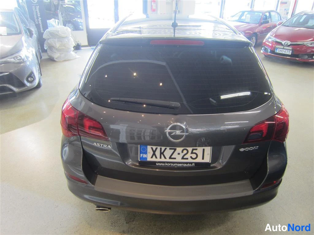 Harmaa Opel Astra 2012, takaa, kuva 8