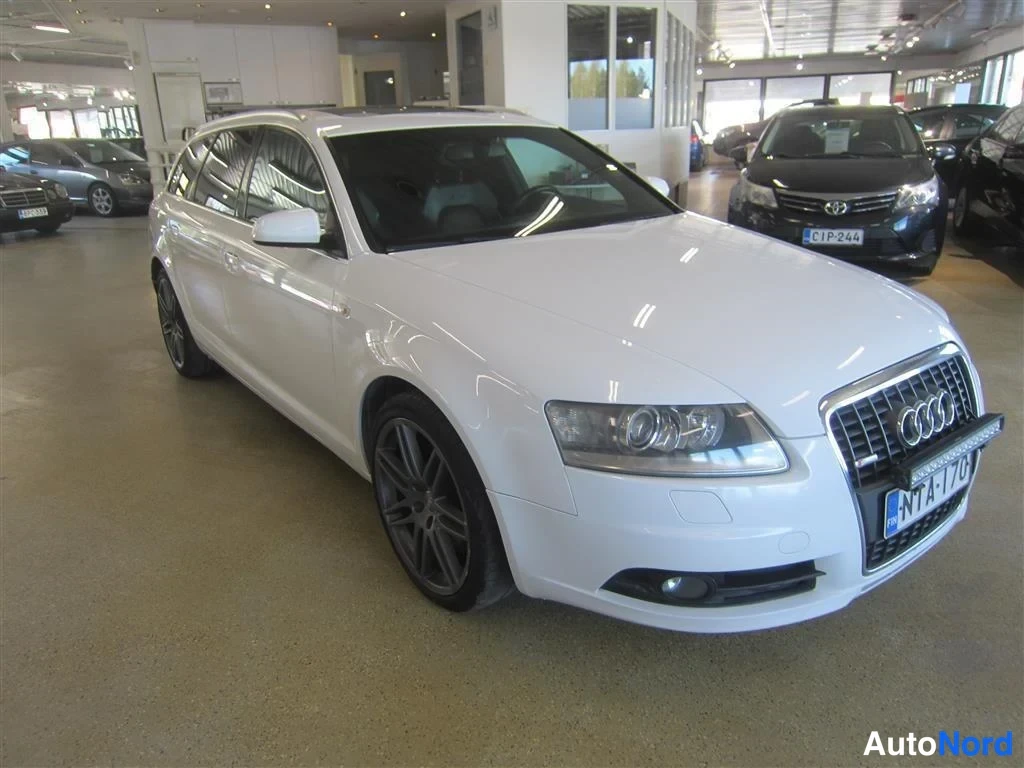 Valkoinen Audi A6 2008, etuviisto, keula oikealle, kuva 2