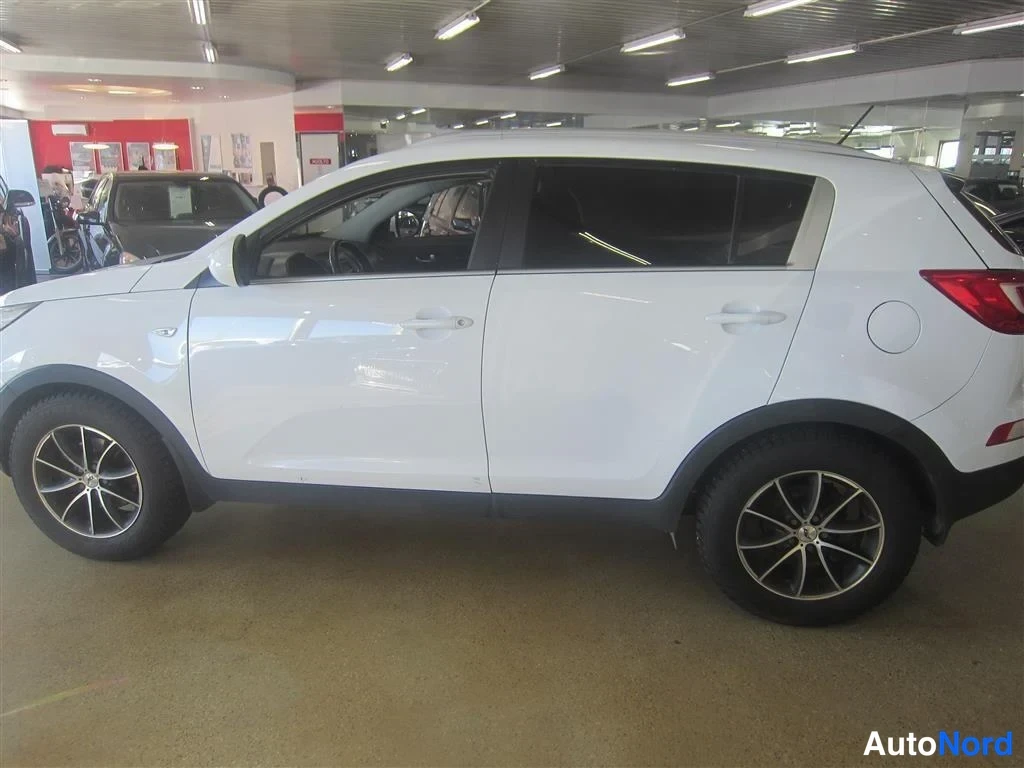 Valkoinen Kia Sportage 2013, sivulta, kuva 5