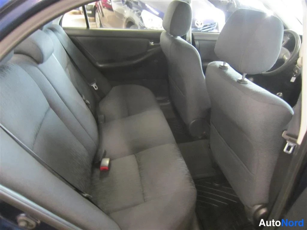 Sininen Toyota Corolla 2003, kuva 18