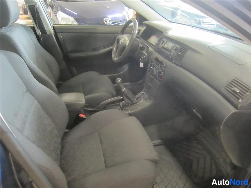 Sininen Toyota Corolla 2003, kuva 19