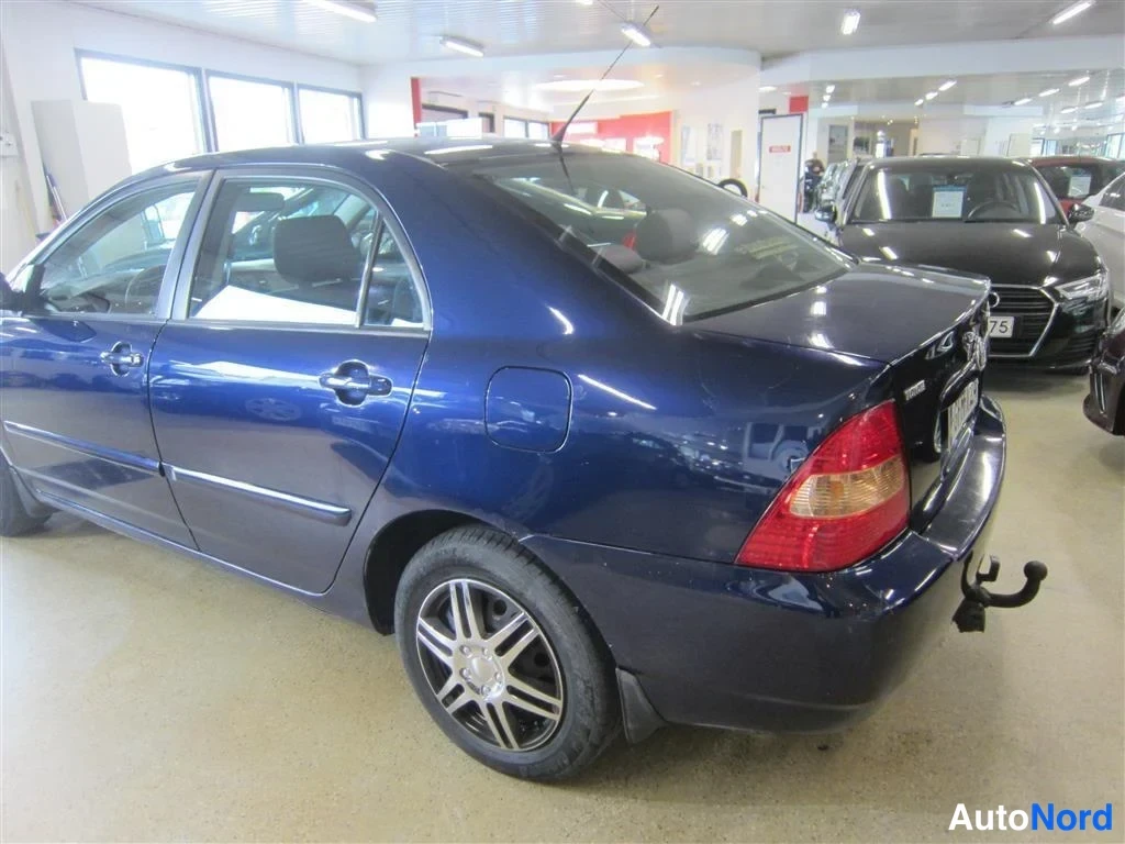 Sininen Toyota Corolla 2003, takaviisto, kuva 6