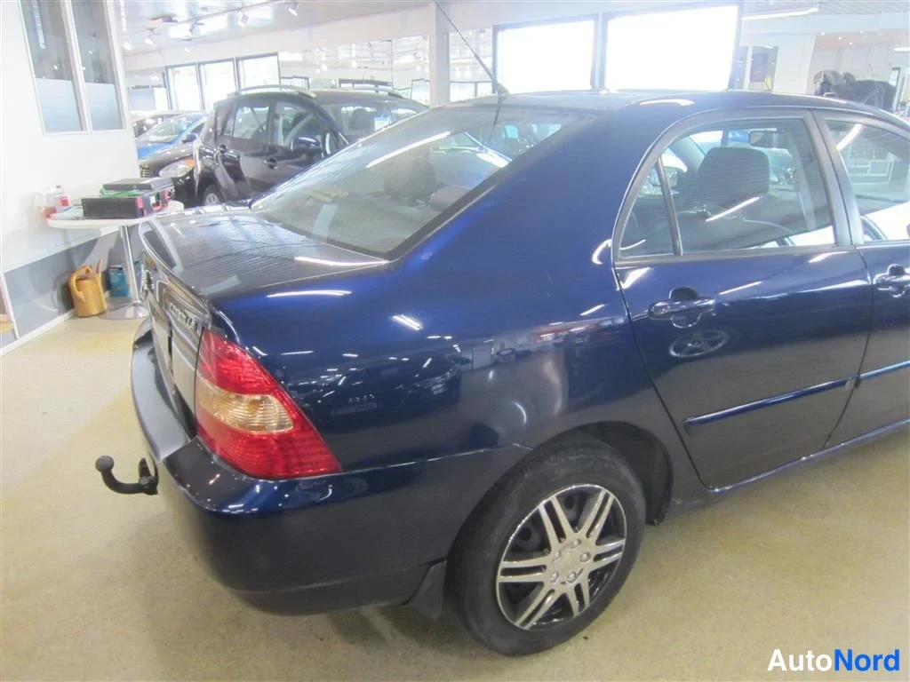 Sininen Toyota Corolla 2003, takaviisto, kuva 7