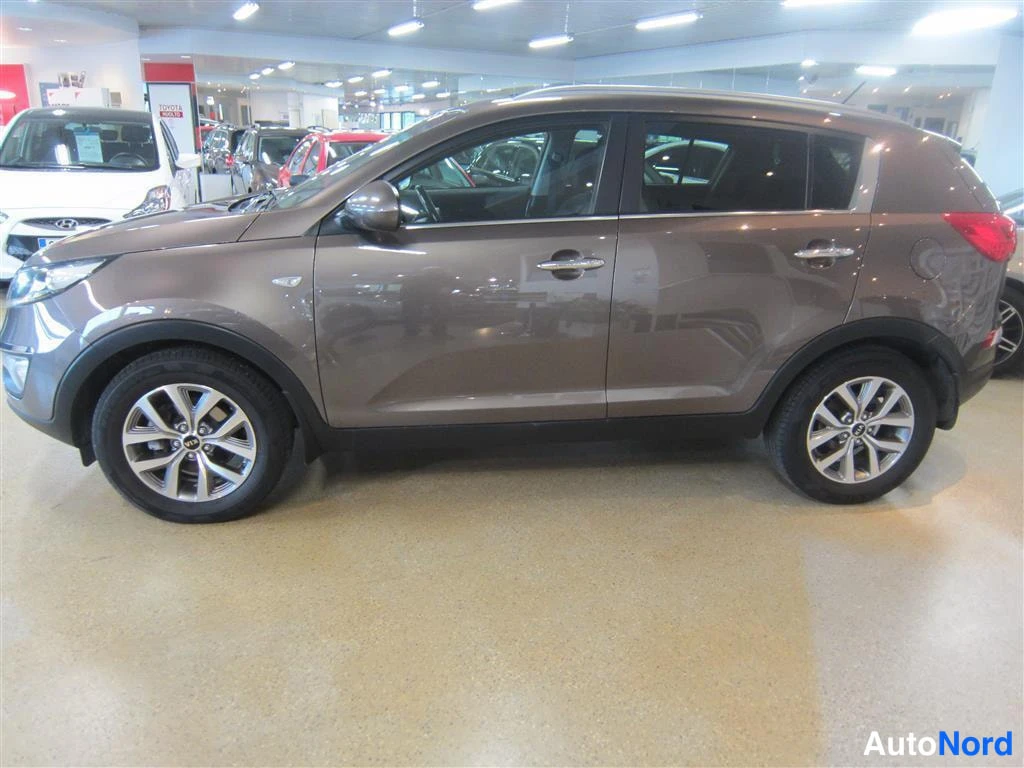 Beige Kia Sportage 2016, etuviisto, keula vasemmalle, kuva 2