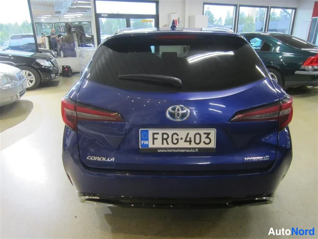 Sininen Toyota Corolla 2023, takaa, kuva 8
