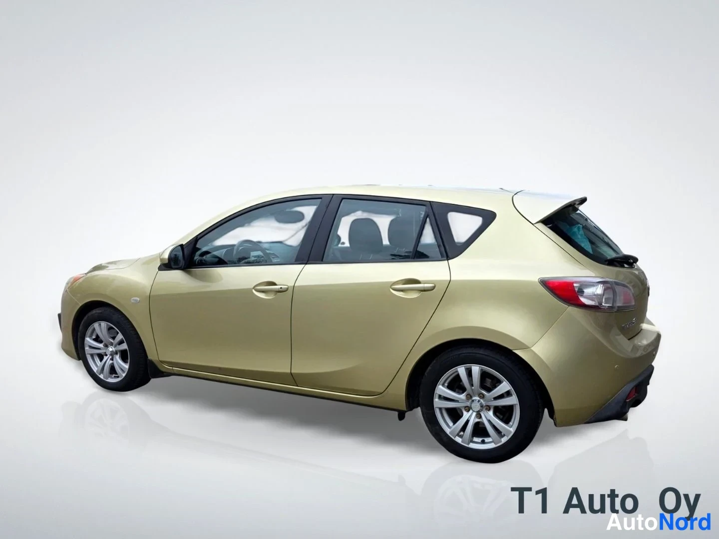 Keltainen Mazda 3 2009, takaviisto, kuva 15