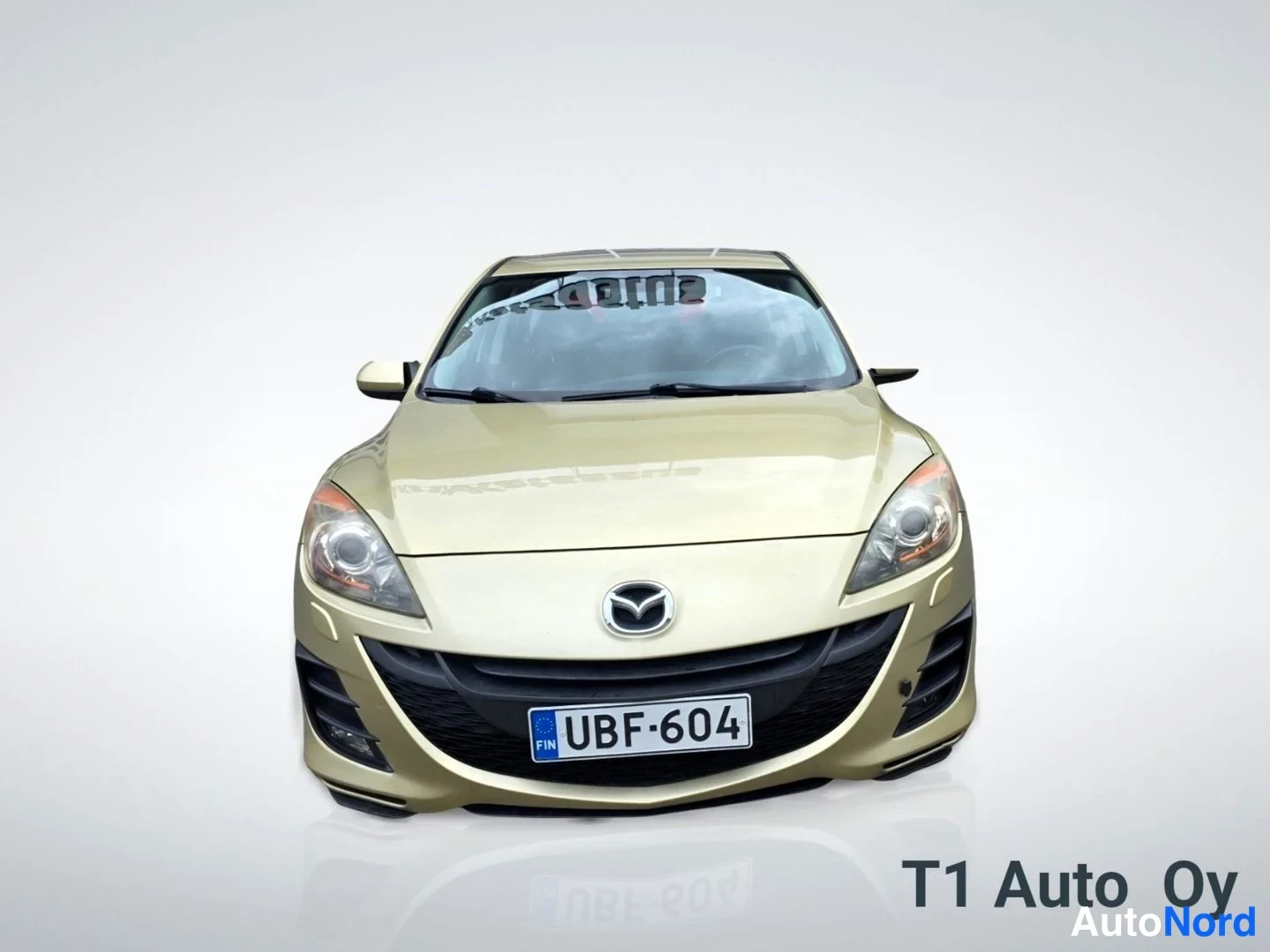 Keltainen Mazda 3 2009, edestä, kuva 9
