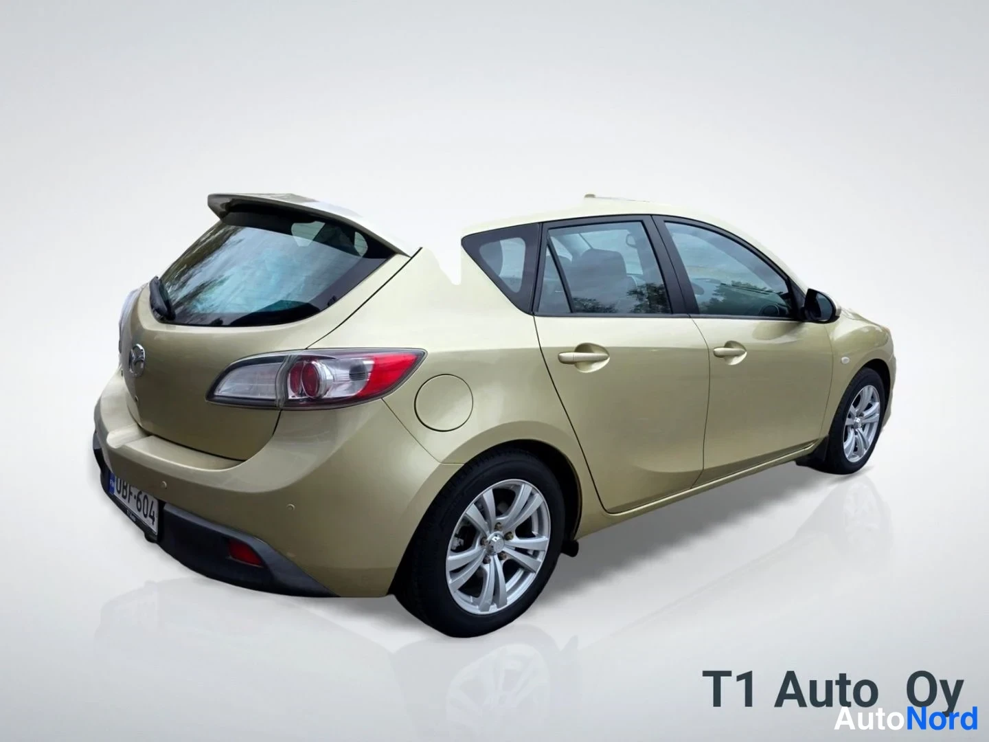 Keltainen Mazda 3 2009, takaviisto, kuva 11