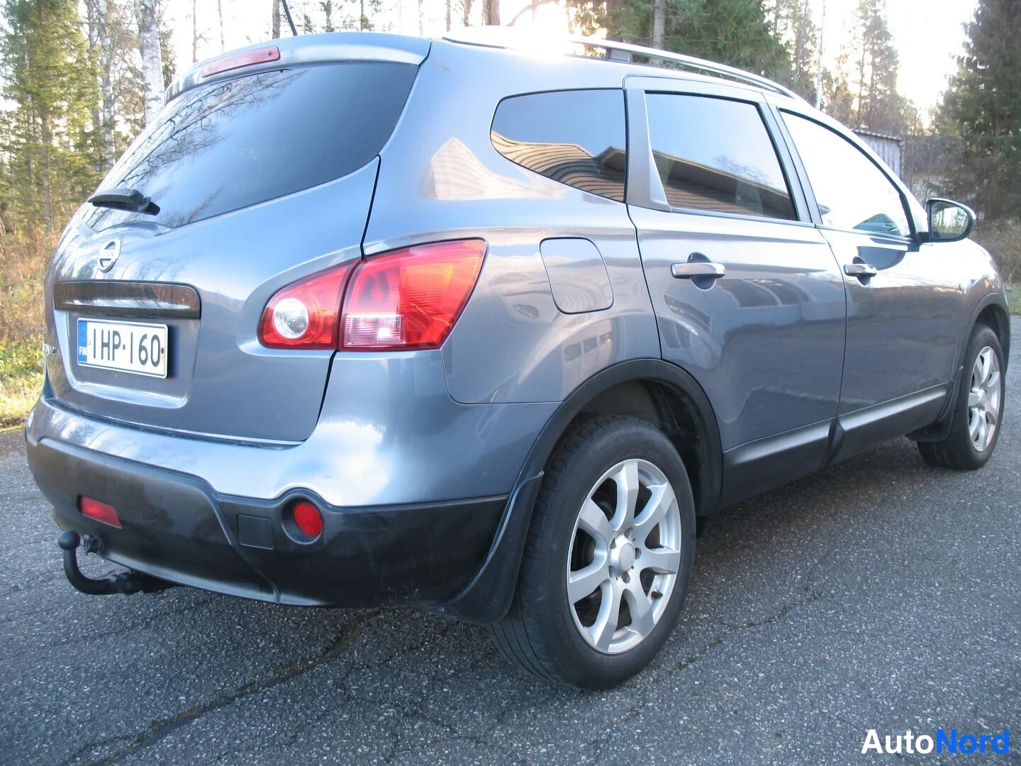 Turkoosi Nissan Qashqai+2 2009, takaviisto, kuva 12