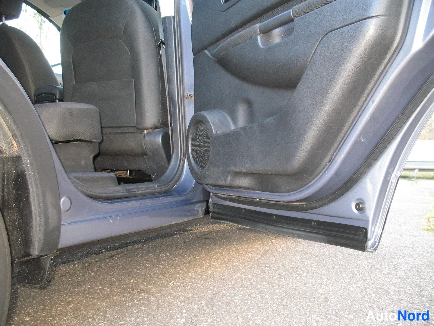 Turkoosi Nissan Qashqai+2 2009, takaistuimet, kuva 24