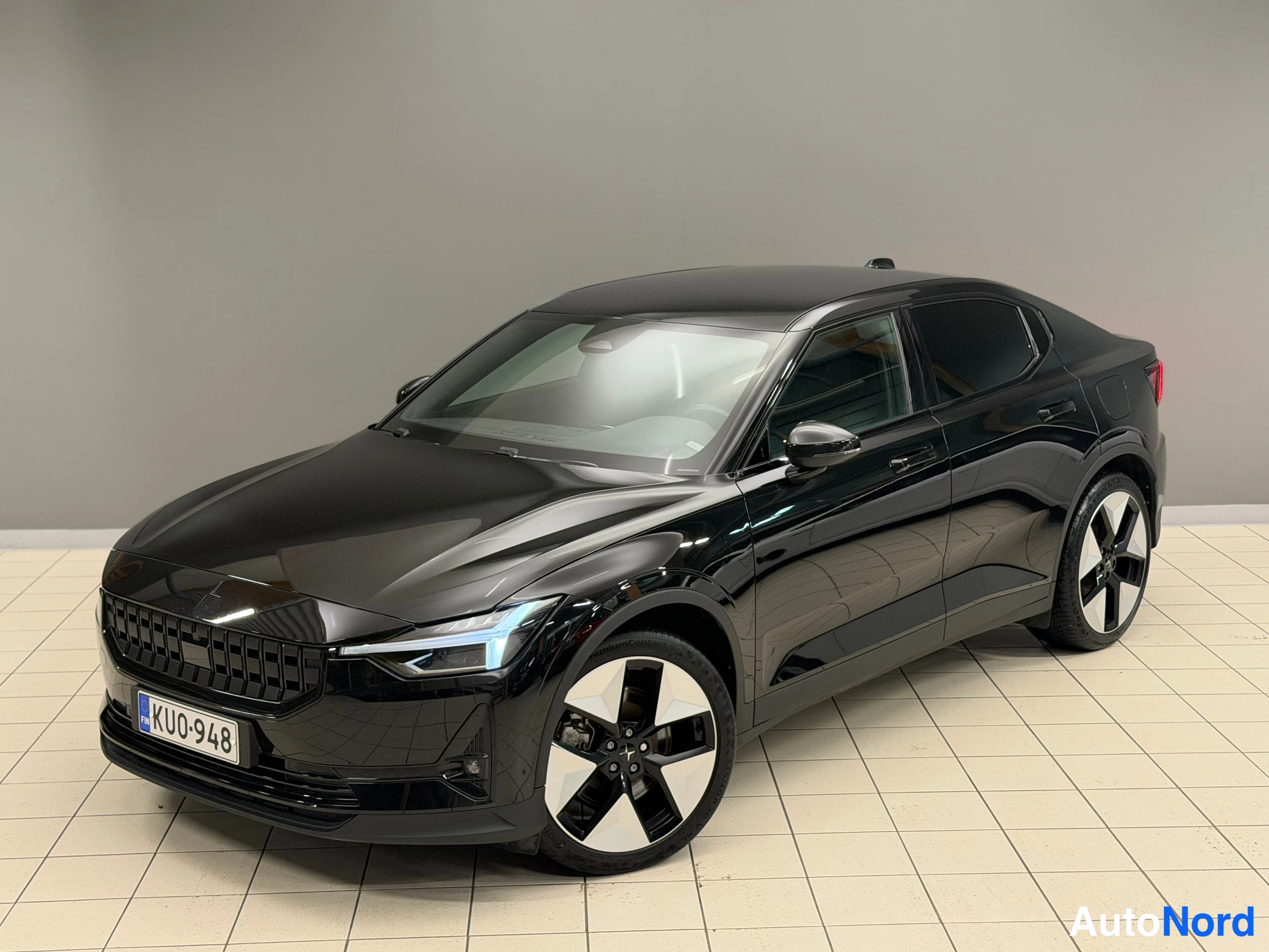 Black Polestar 2 2023, front three-quarter, nose to the left, photo 2