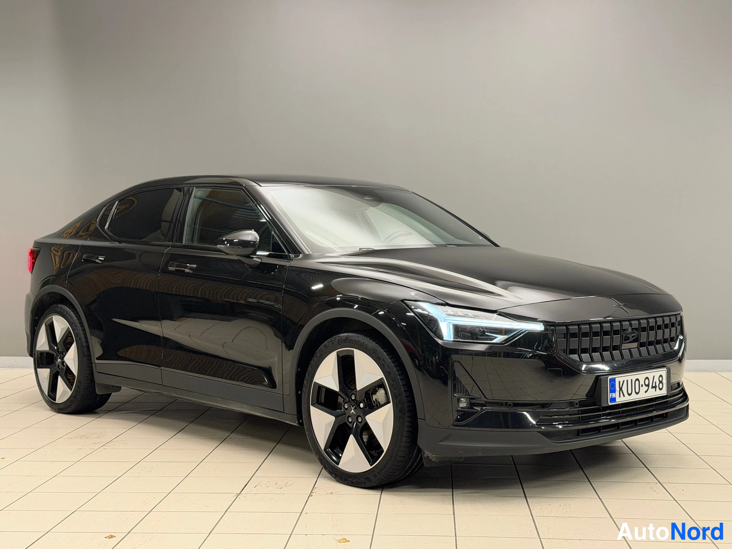 Black Polestar 2 2023, front three-quarter, nose to the right, photo 5