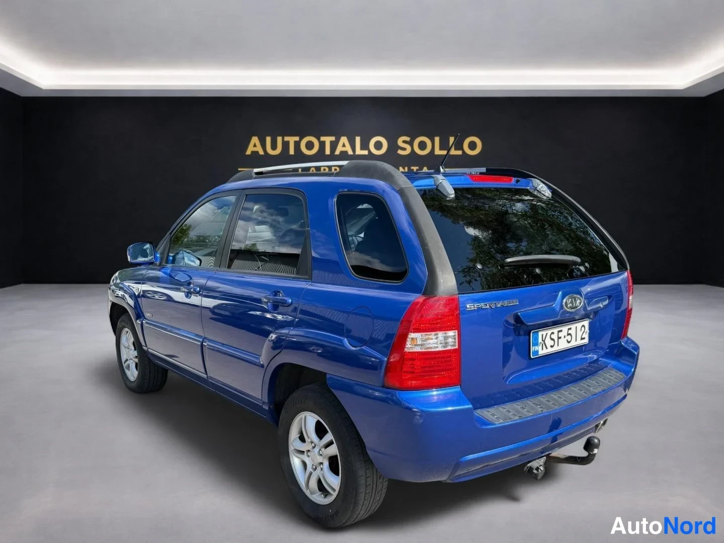 Sininen Kia Sportage 2006, takaviisto, kuva 4