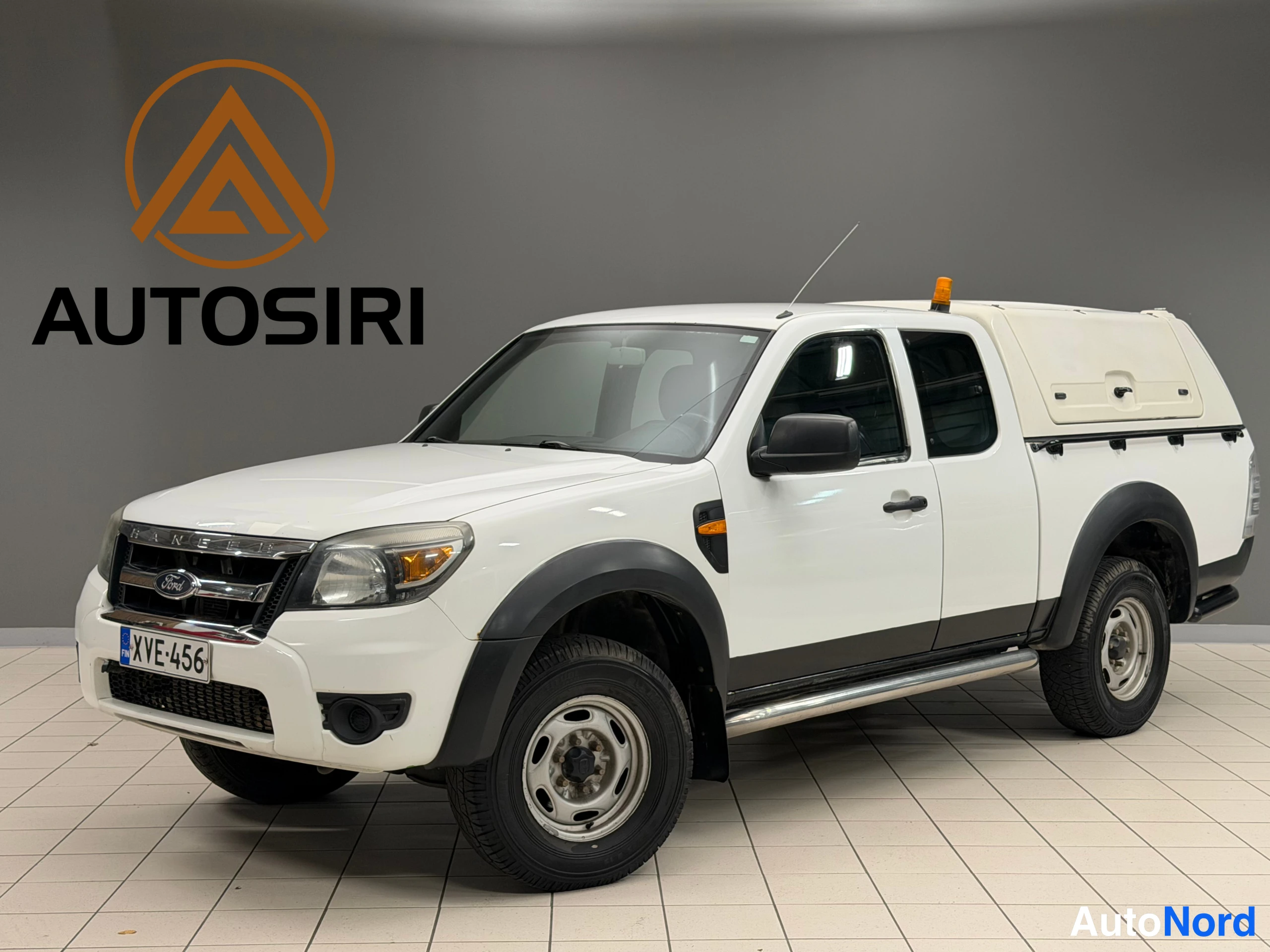 Valkoinen Ford Ranger 2010, etuviisto, keula vasemmalle, kuva 4