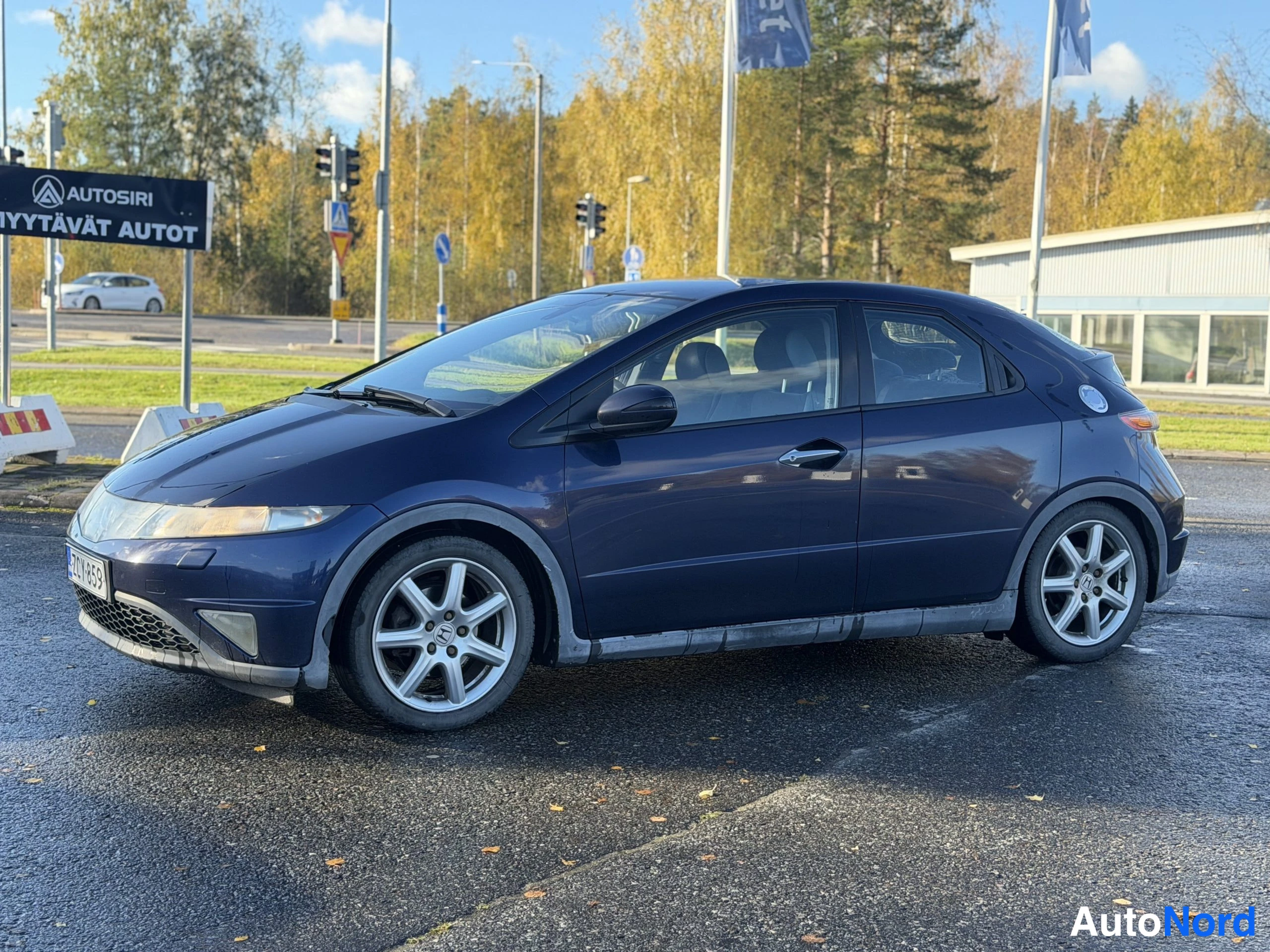 Sininen Honda Civic 2006, etuviisto, keula vasemmalle, kuva 4