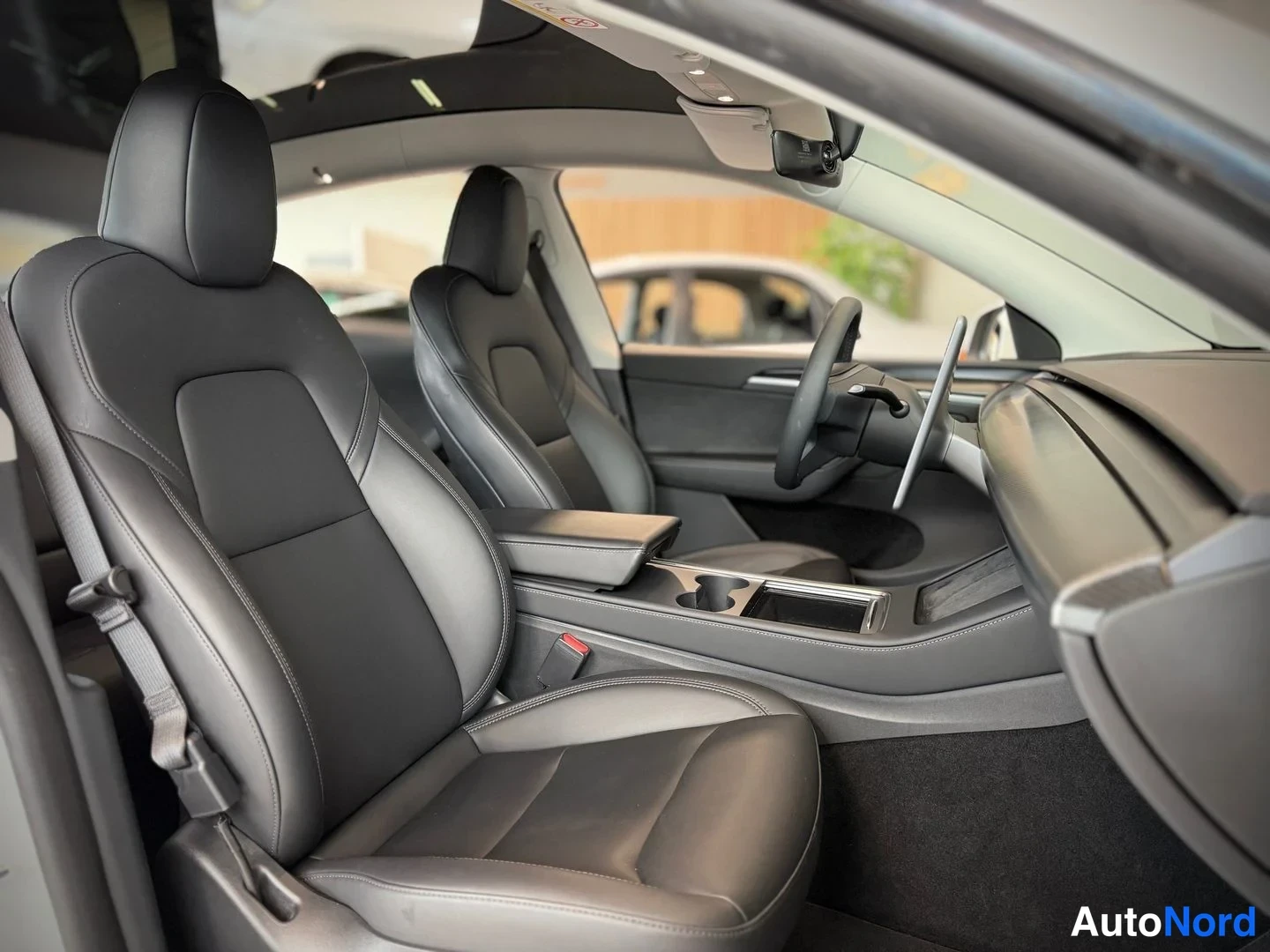 White Tesla Model Y Performance 2023, front seats, photo 12