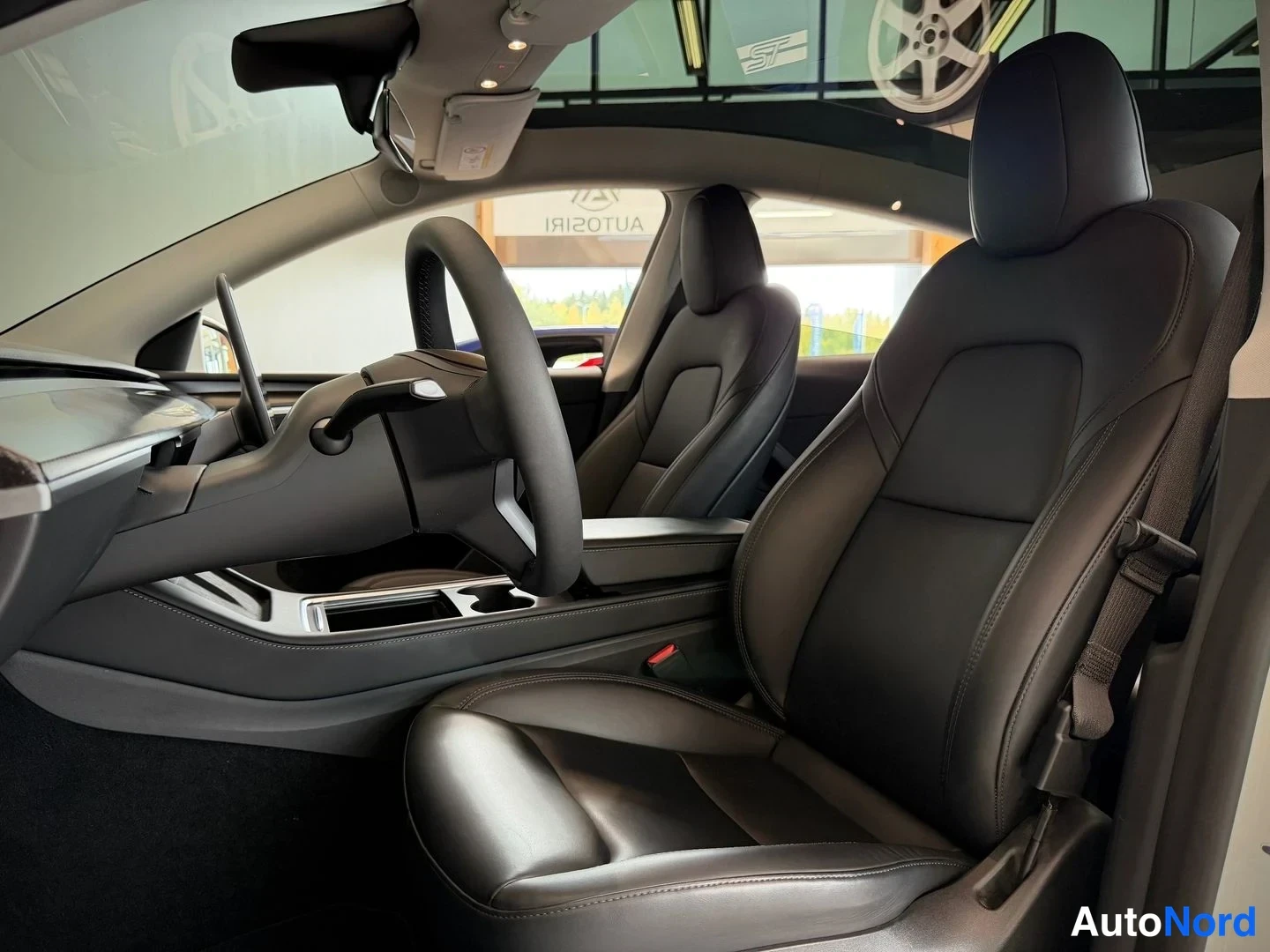 White Tesla Model Y Performance 2023, front seats, photo 13