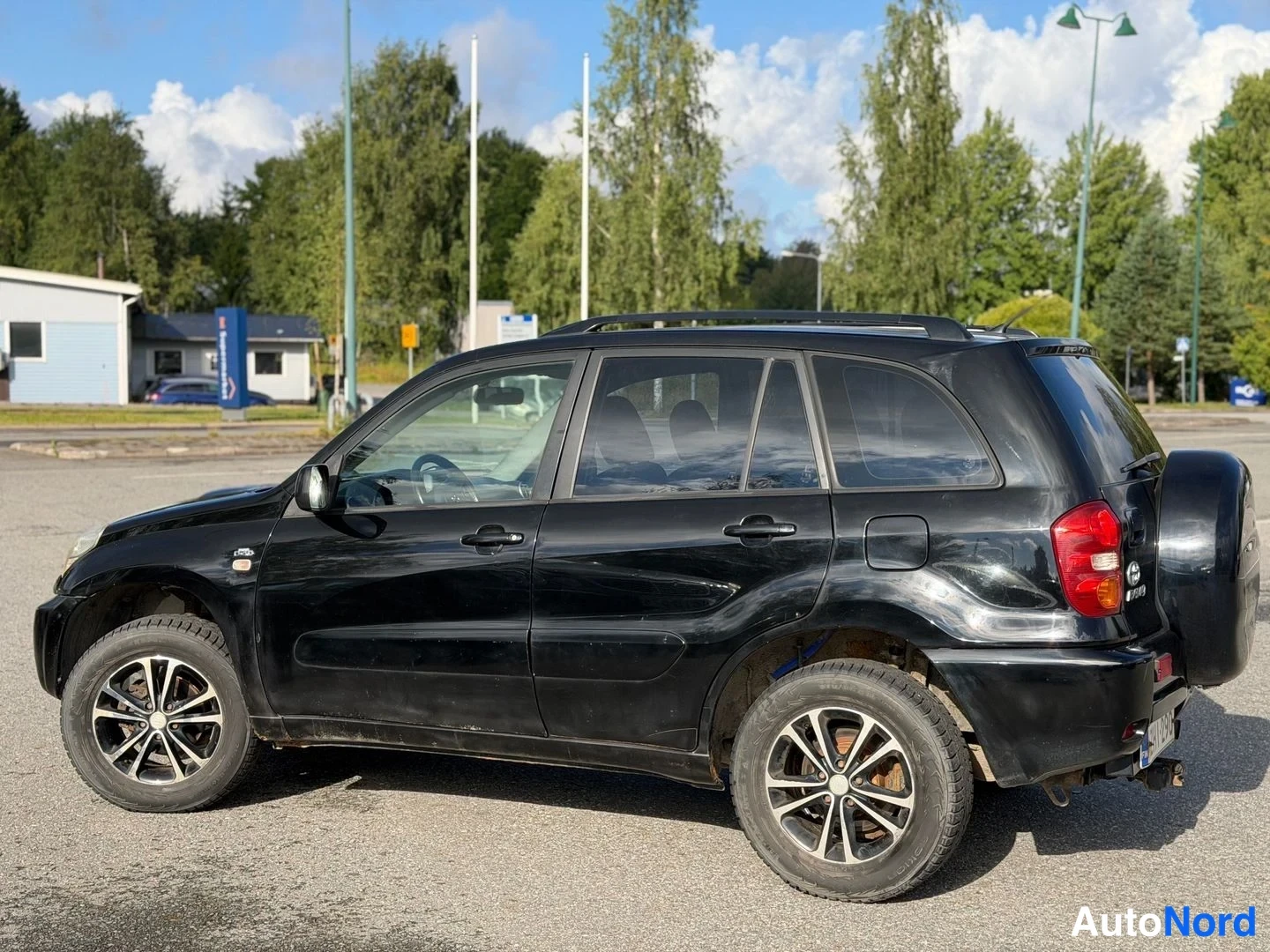 Musta Toyota RAV4 2005, takaviisto, kuva 4