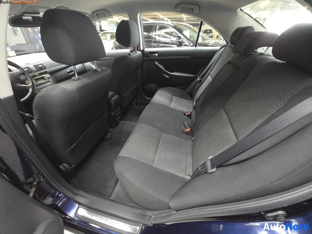 Sininen Toyota Avensis 2006, takaistuimet, kuva 26