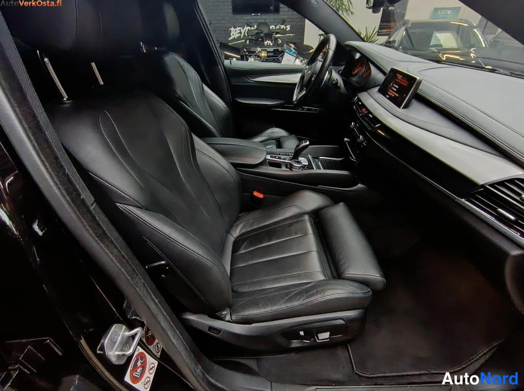 Musta BMW X6 2015, etuistuimet, kuva 13