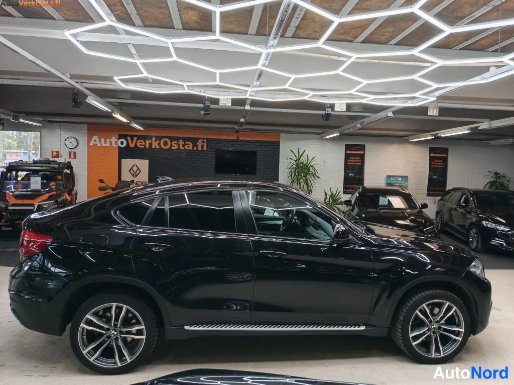 Musta BMW X6 2015, etuviisto, keula oikealle, kuva 2