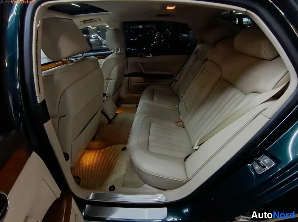Vihreä Volkswagen Phaeton 2009, takaistuimet, kuva 16
