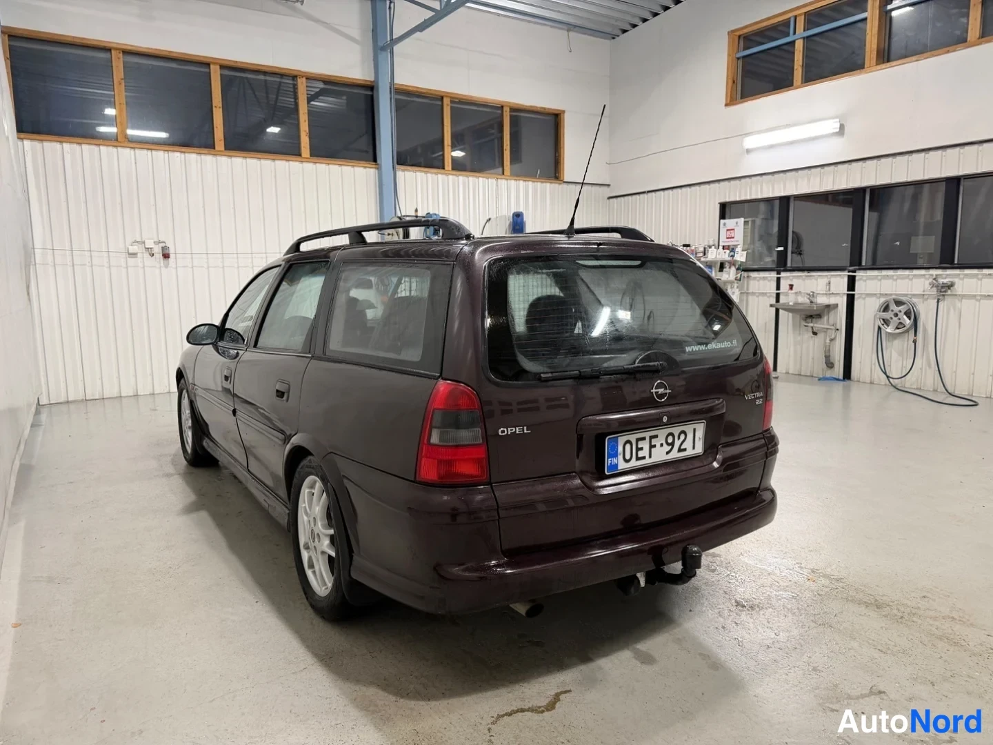 Ruskea Opel Vectra 2001, takaviisto, kuva 5