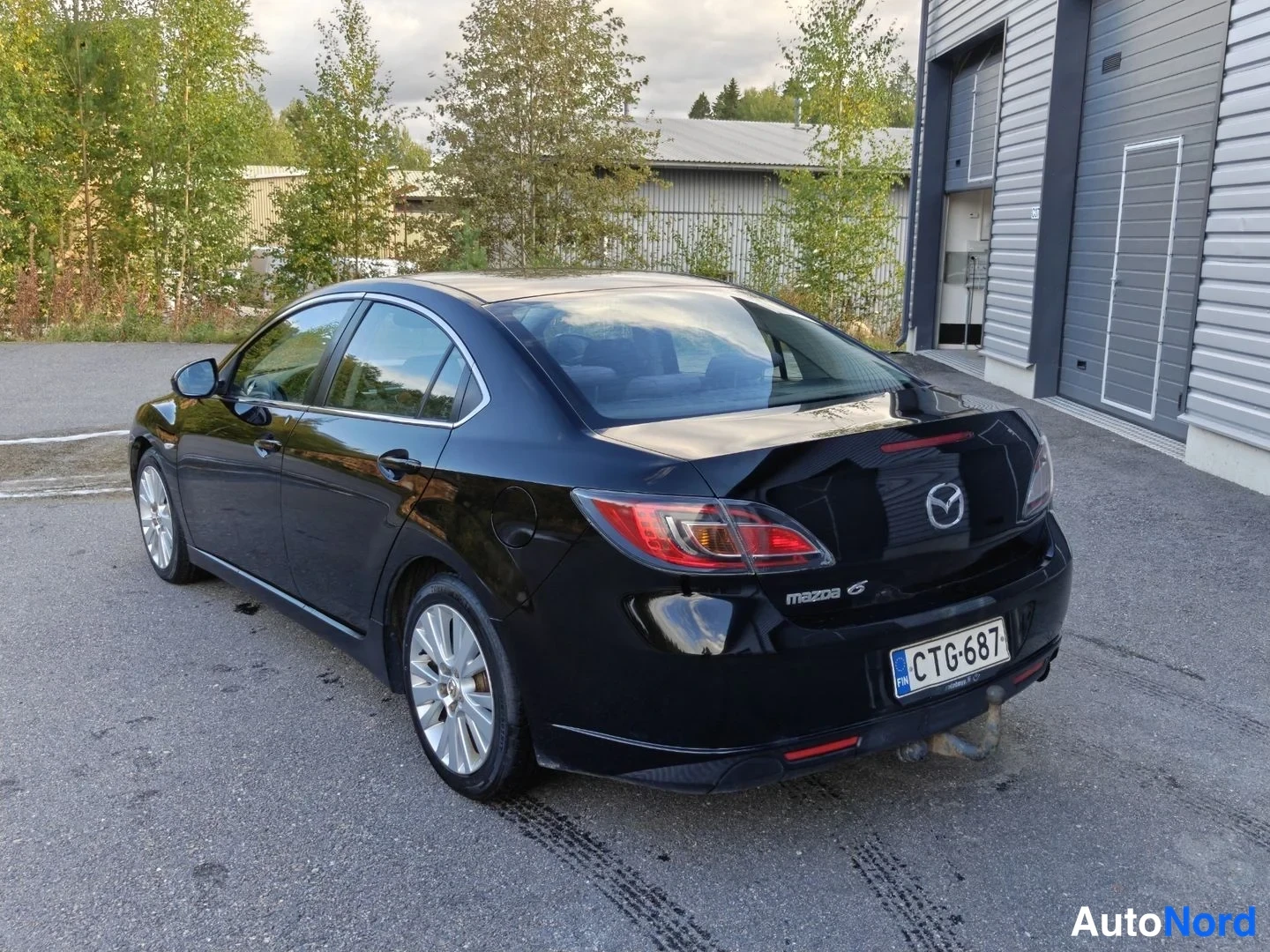 Musta Mazda 6 2009, takaviisto, kuva 3