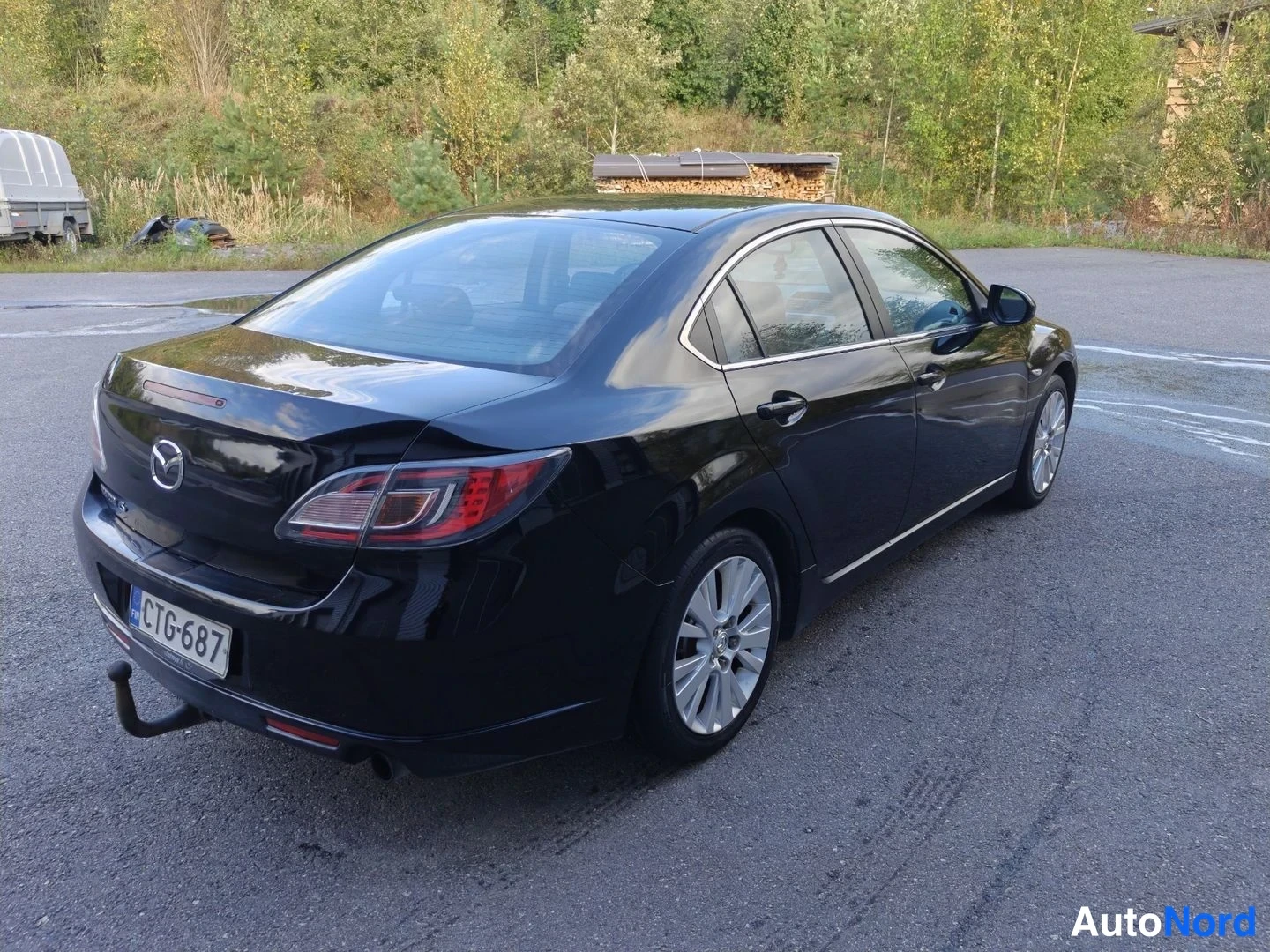Musta Mazda 6 2009, takaviisto, kuva 4