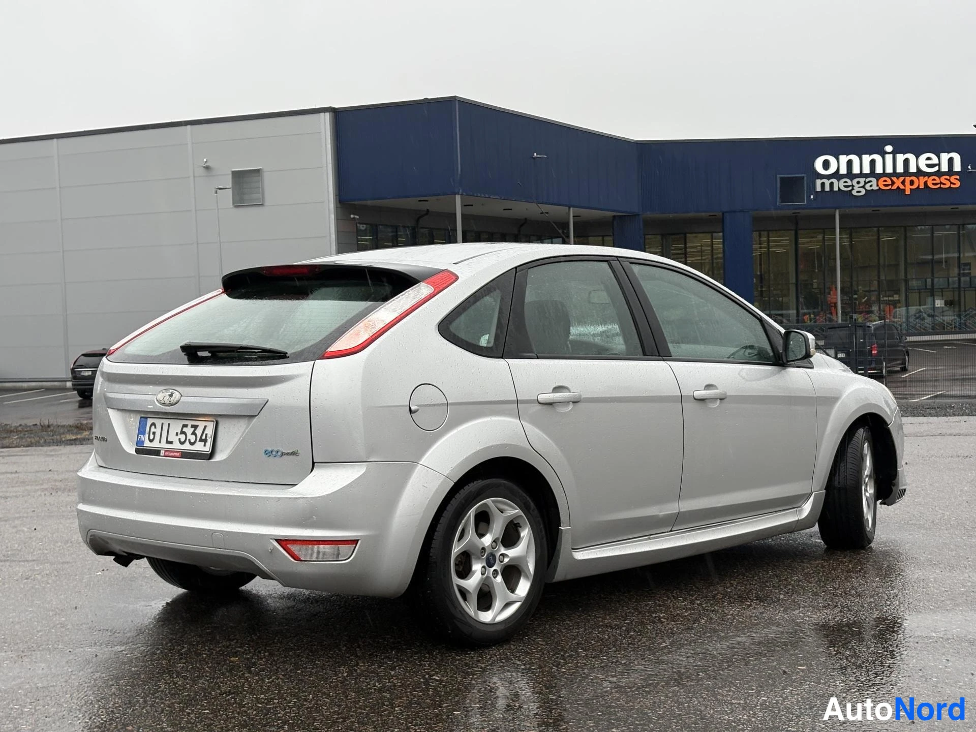 Harmaa Ford Focus 2009, takaviisto, kuva 3