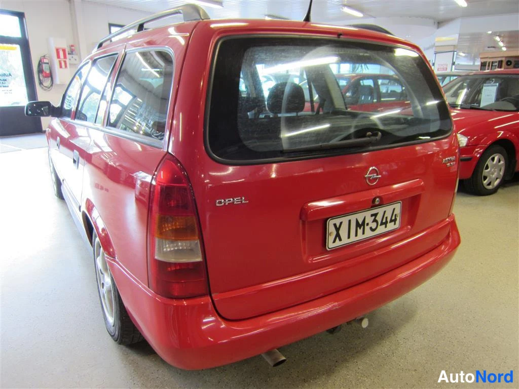 Punainen Opel Astra 1999, takaviisto, kuva 4