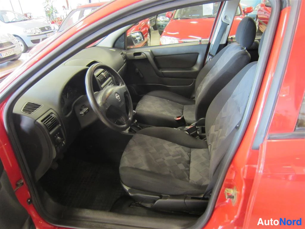 Punainen Opel Astra 1999, ohjaamo, kuva 7