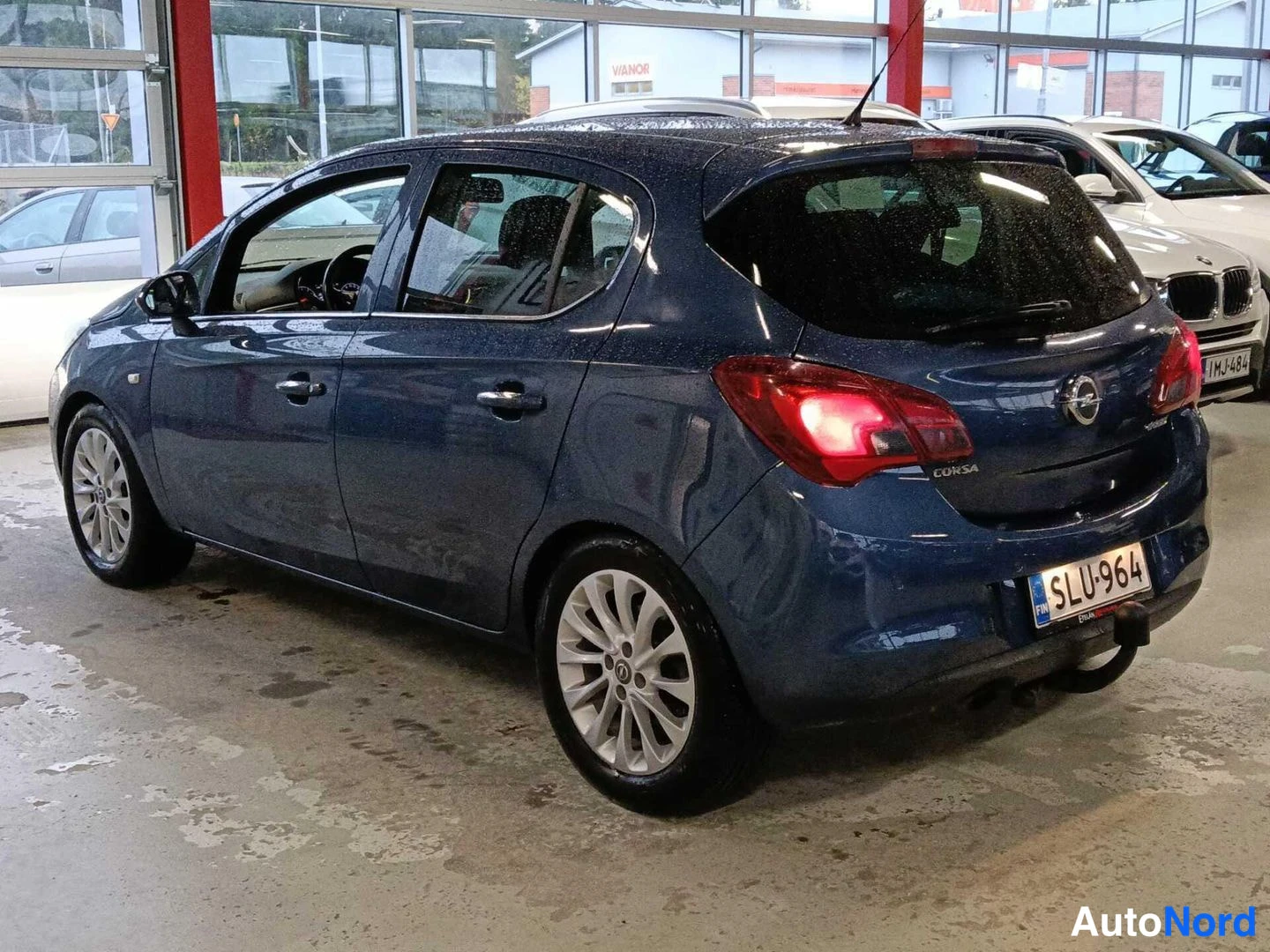 Sininen Opel Corsa 2015, takaviisto, kuva 3