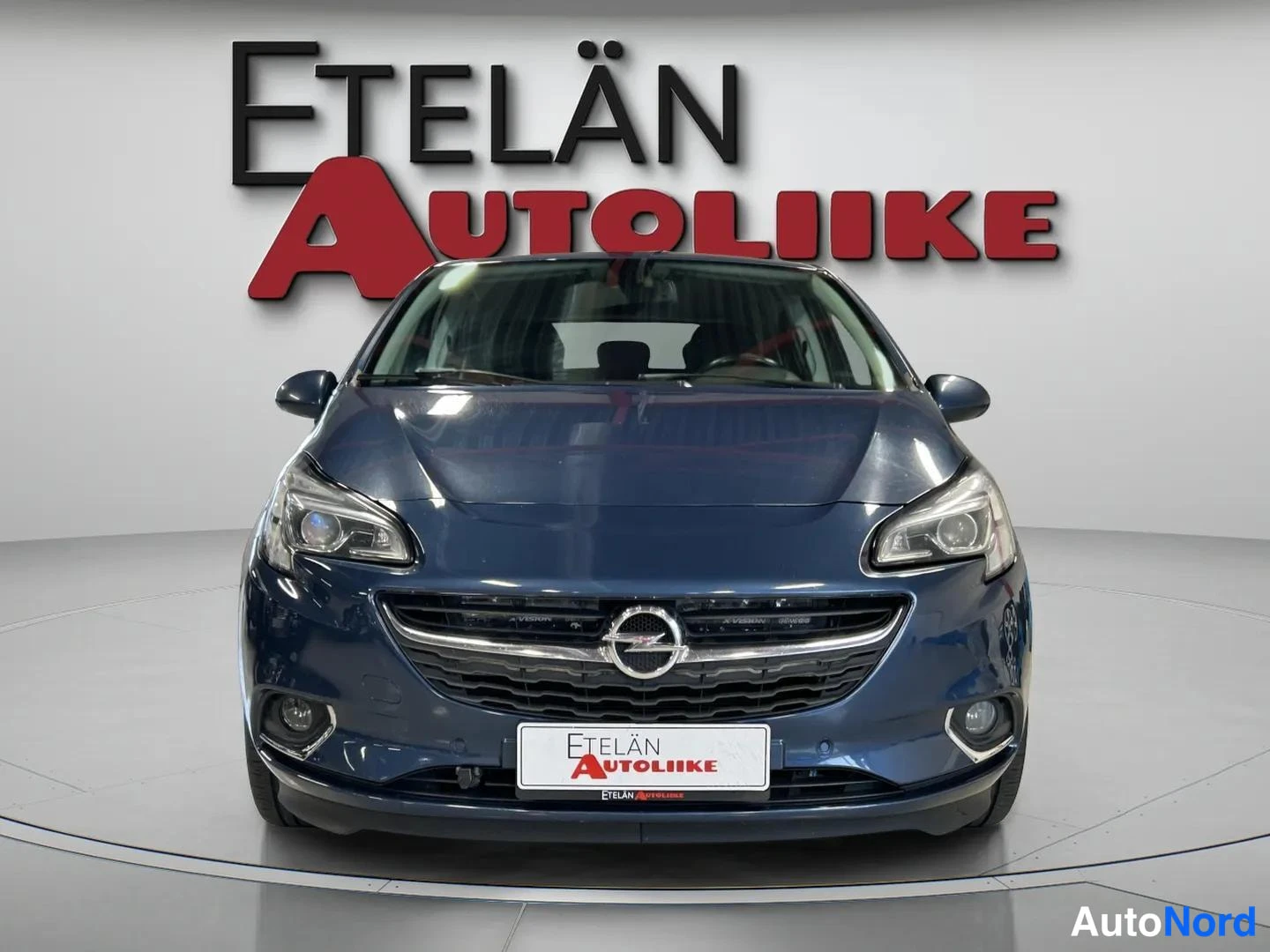 Sininen Opel Corsa 2015, edestä, kuva 4