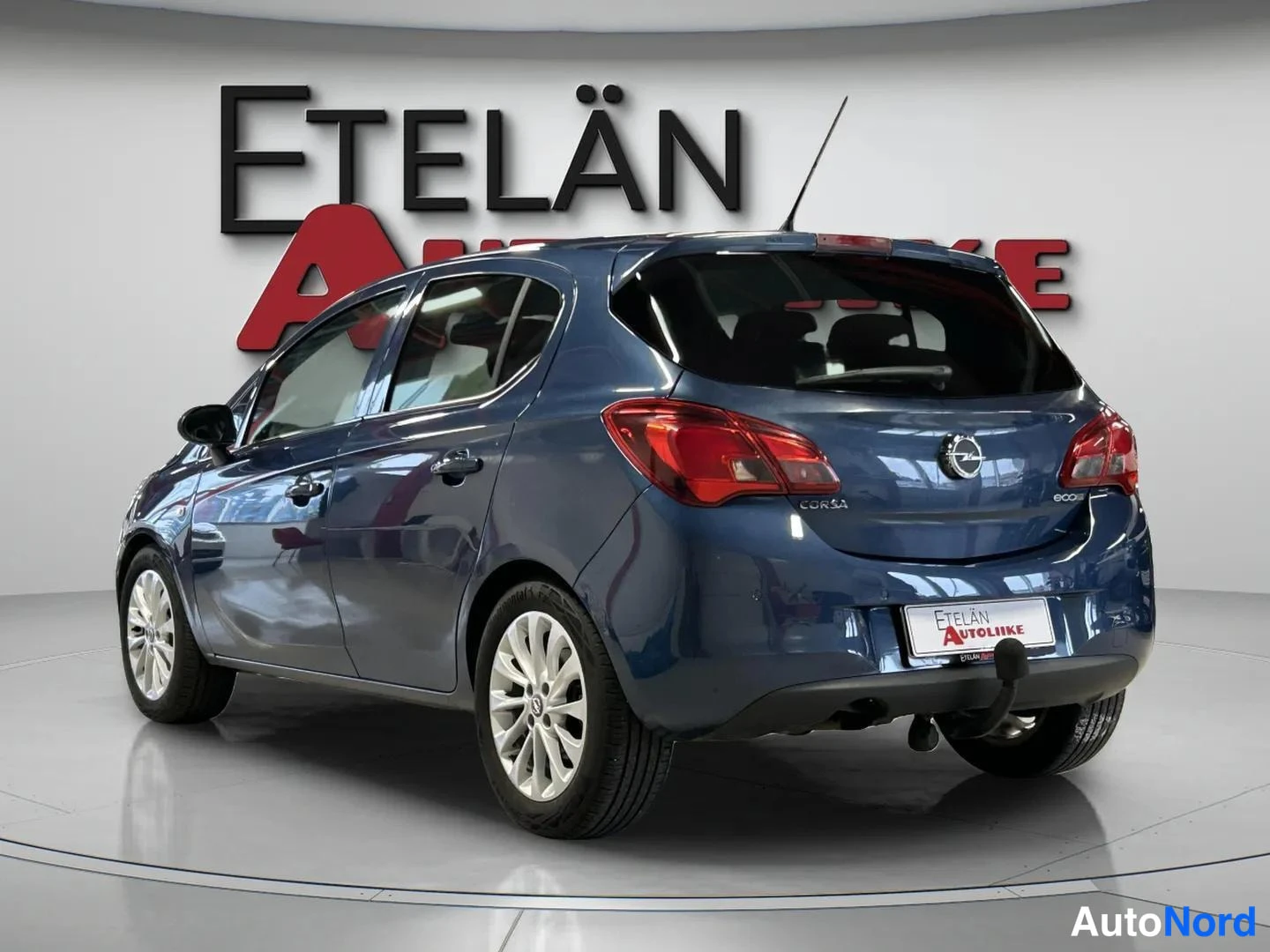 Sininen Opel Corsa 2015, takaviisto, kuva 5
