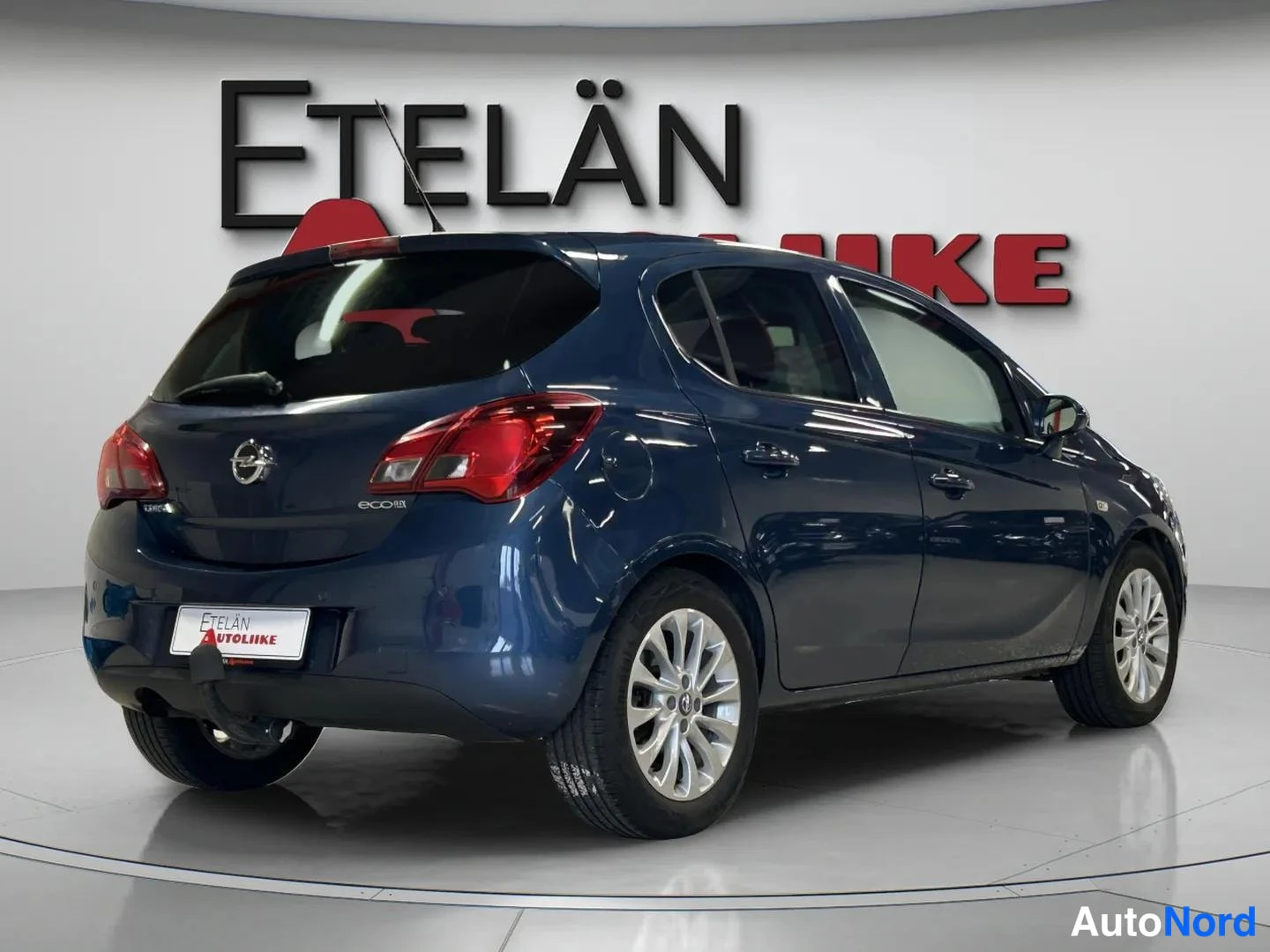 Sininen Opel Corsa 2015, takaviisto, kuva 6