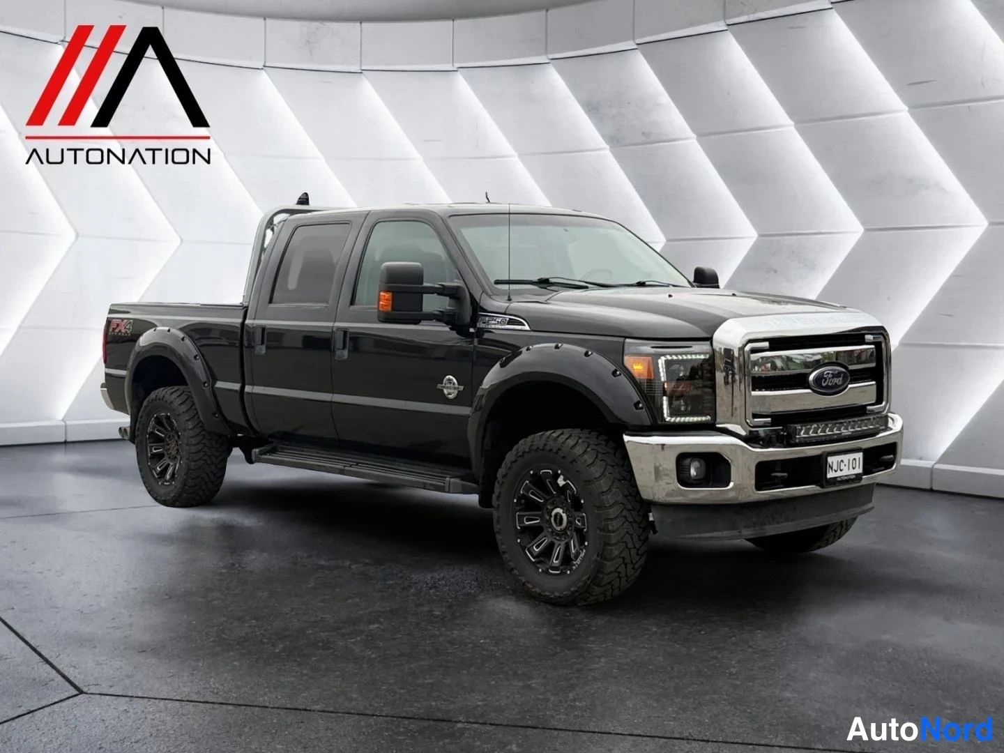 Black Ford F-250 2012, front three-quarter, nose to the right, photo 2