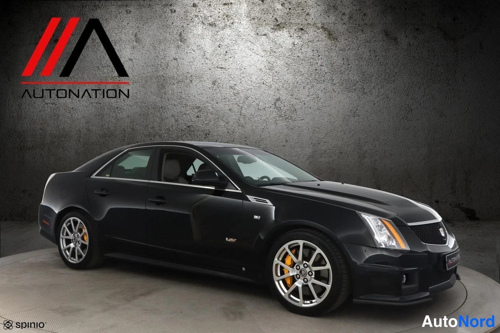 Black Cadillac CTS-V 2010, front three-quarter, nose to the right, photo 3