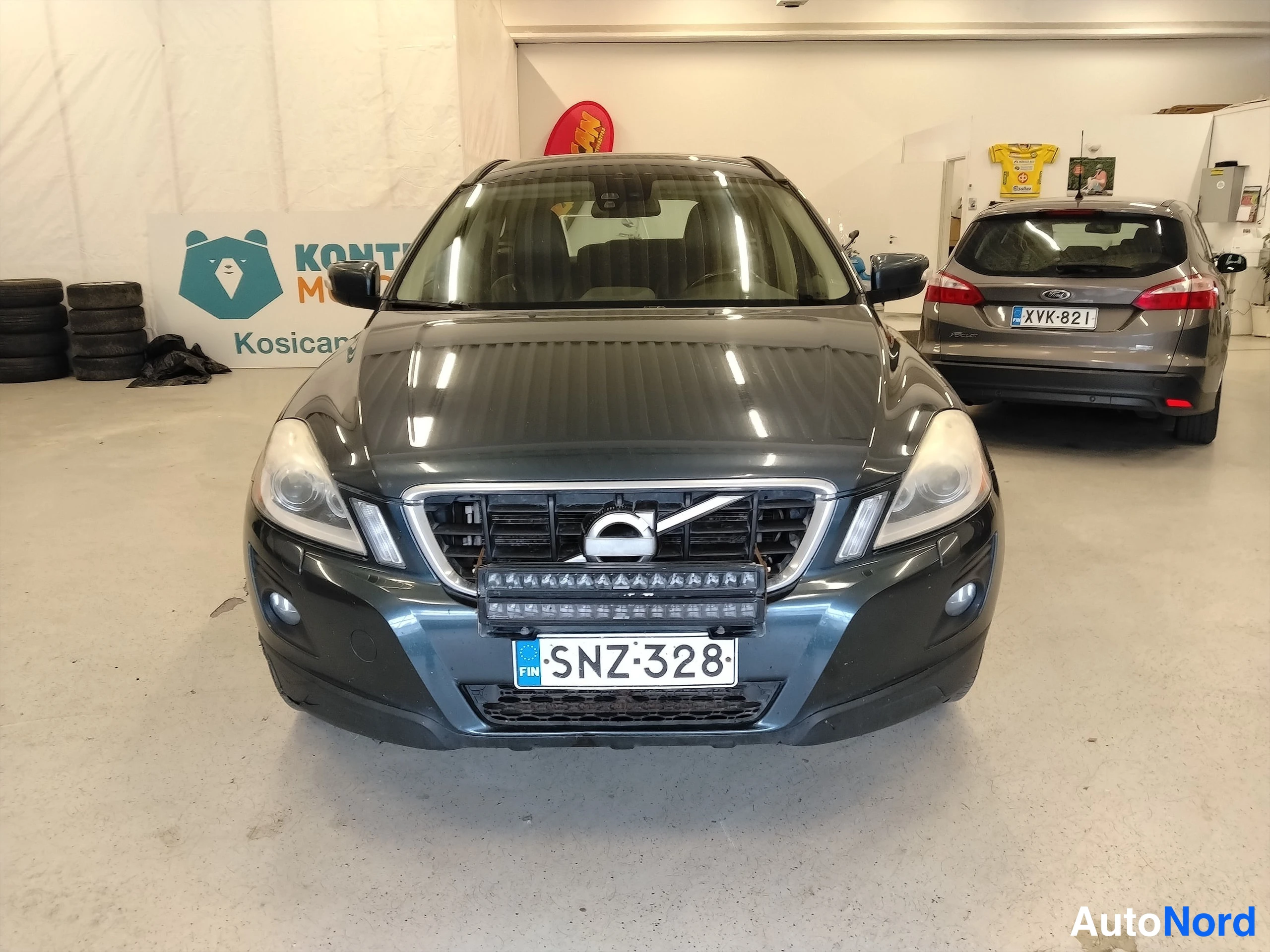 Sininen Volvo XC60 2010, edestä, kuva 6