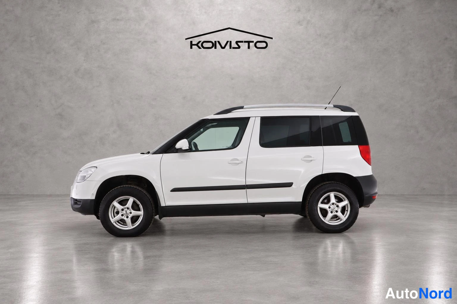 Valkoinen Skoda Yeti 2010, sivulta, kuva 4