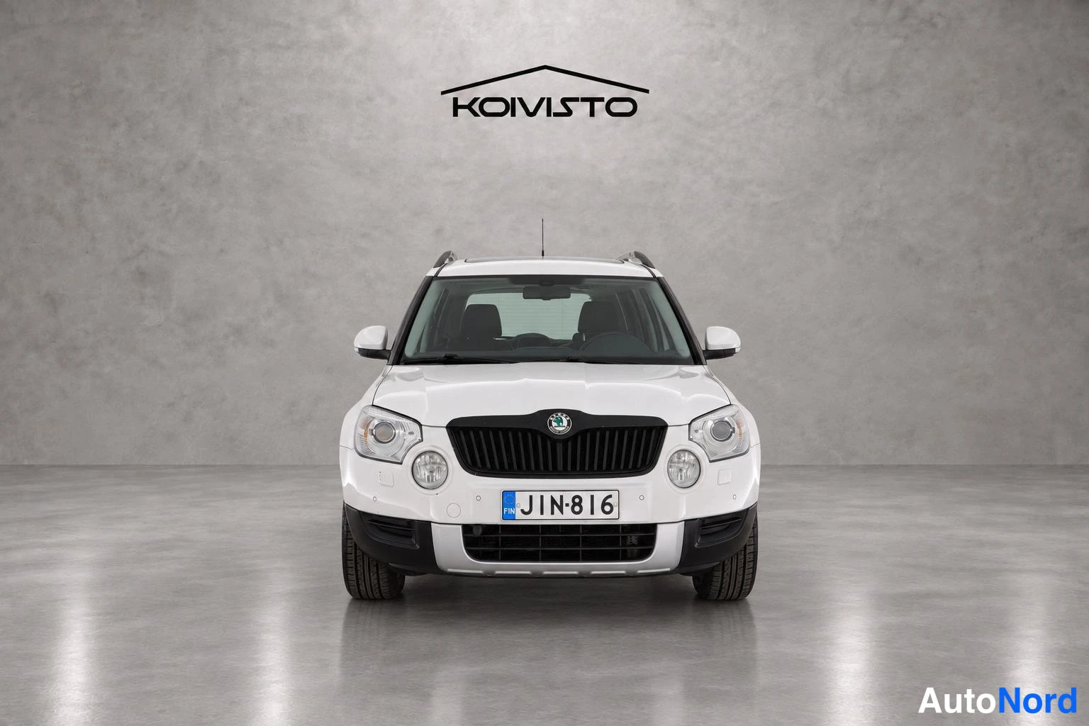 Valkoinen Skoda Yeti 2010, edestä, kuva 3