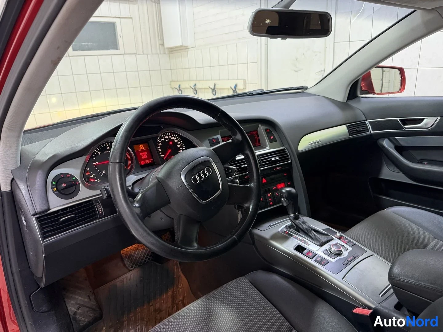 Red Audi A6 allroad quattro 2008, cockpit, photo 11