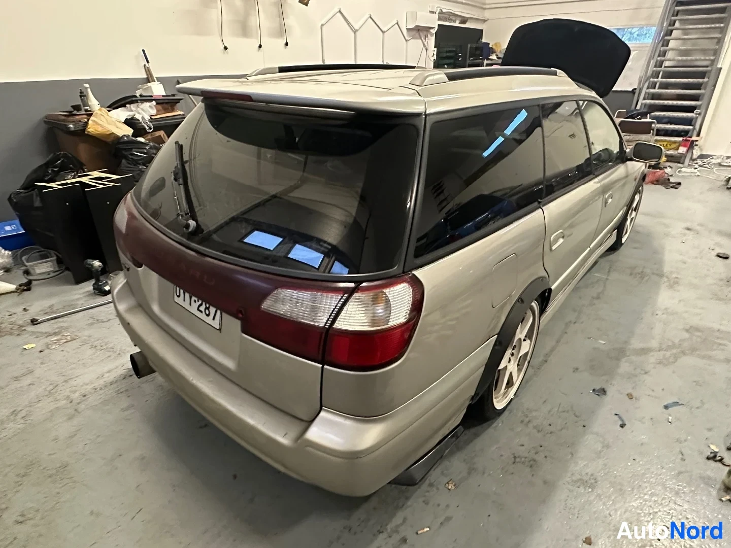 Silver Subaru Legacy 1998, rear three-quarter, photo 3