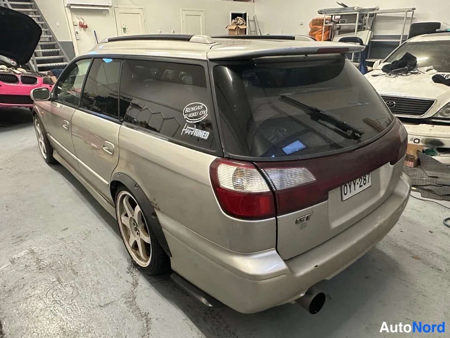 Silver Subaru Legacy 1998, rear three-quarter, photo 4