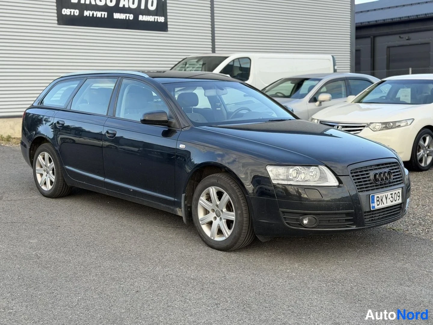 Black Audi A6 2007, front three-quarter, nose to the right, photo 2