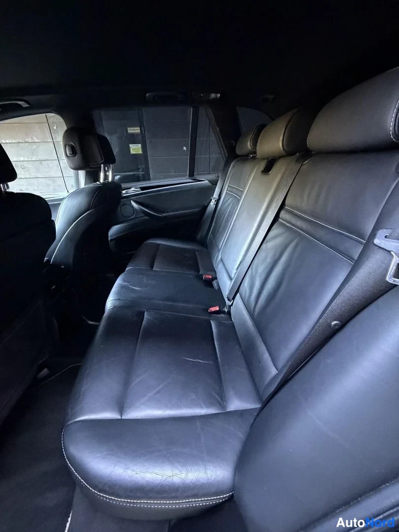 Black BMW X5 2010, rear seats, photo 21