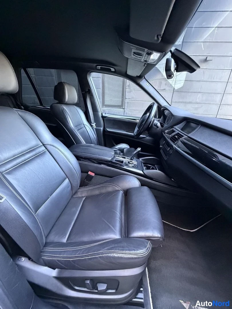 Black BMW X5 2010, front seats, photo 18